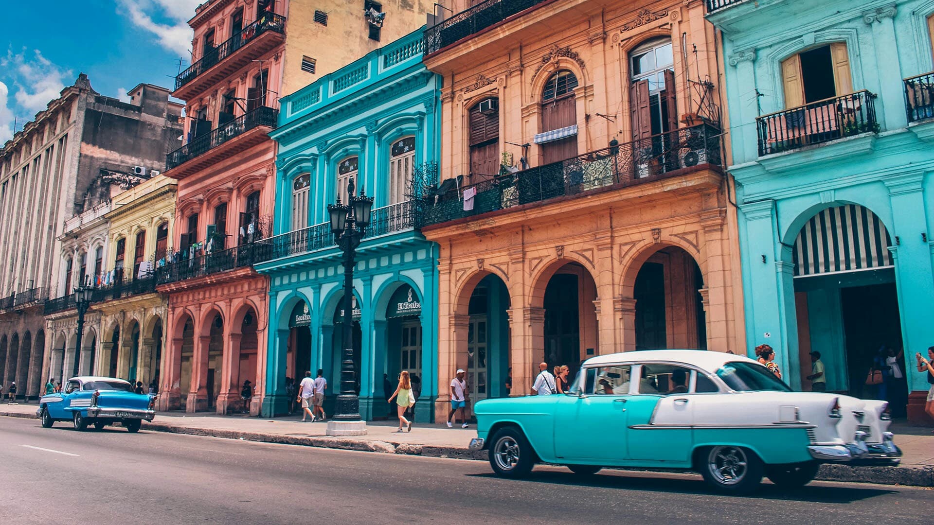 Old Havana street of independent businesses, not a state resort